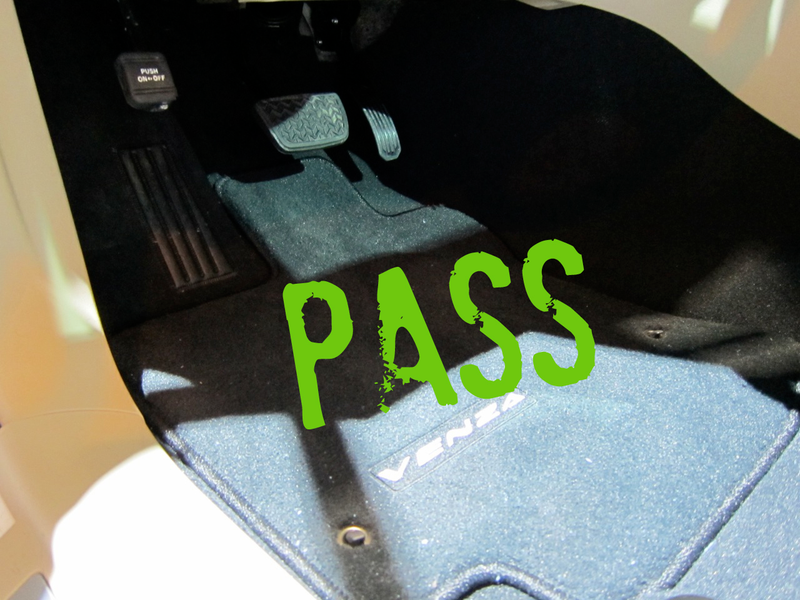 Illustration for article titled Toyota Recall: Three Chicago Show Vehicles Fail Floor Mat Check